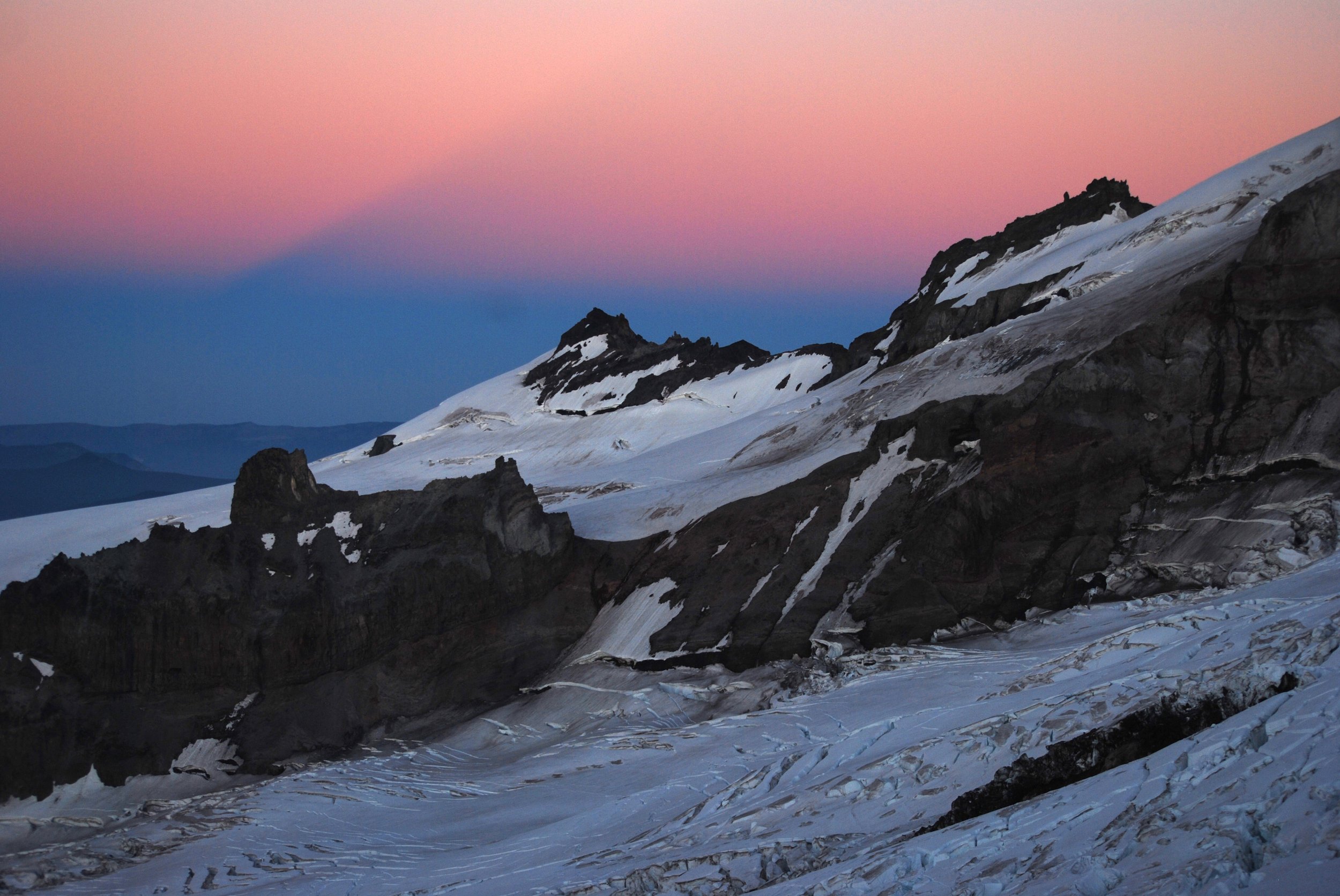 Mountain shadow in sunset sky